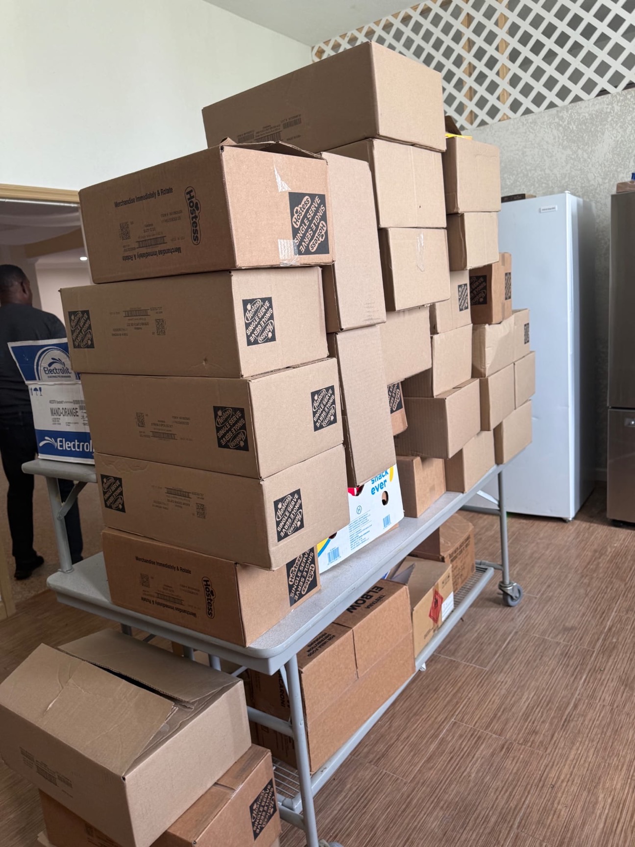 Boxed food supplies prepared for community distribution.