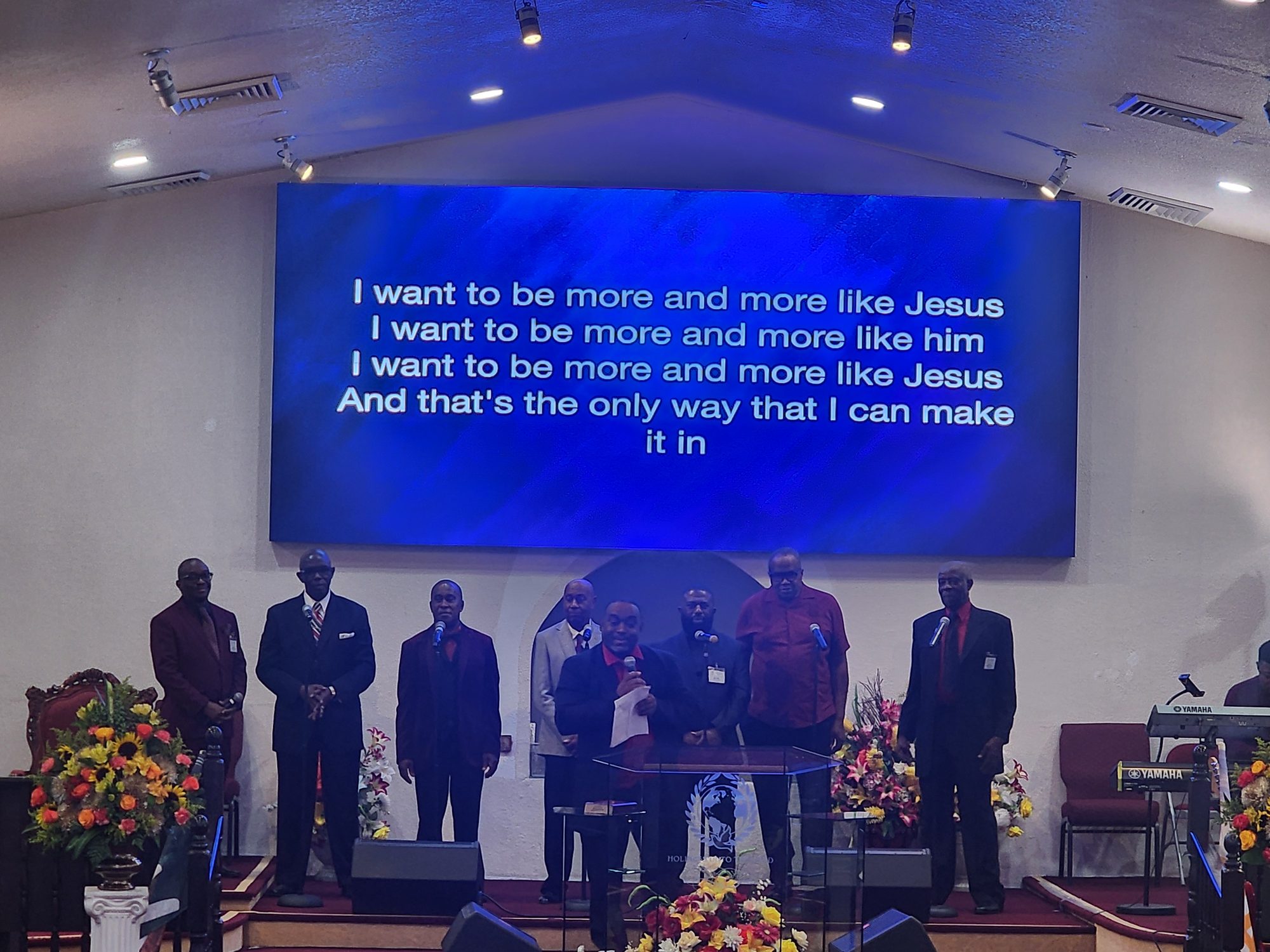 Men's group leading worship during the Ingathering service.