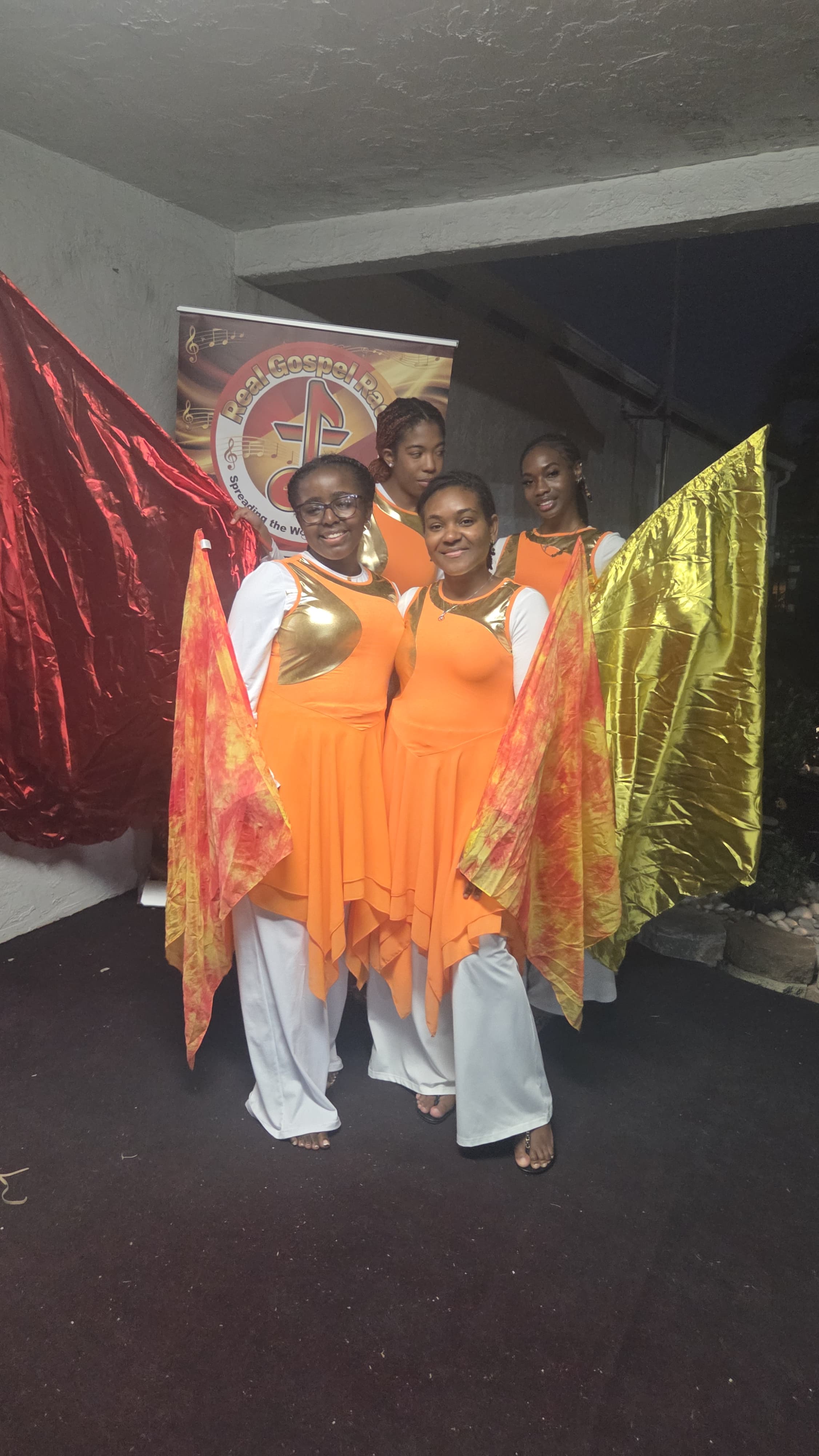 Youth Ministry praise team with flags at a community event.